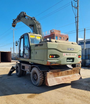 Máy đào bánh lốp Doosan DX210W đời 2009 | Bản Đặc Biệt