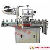 Máy Chụp Màng Thân Và Nắp Chai